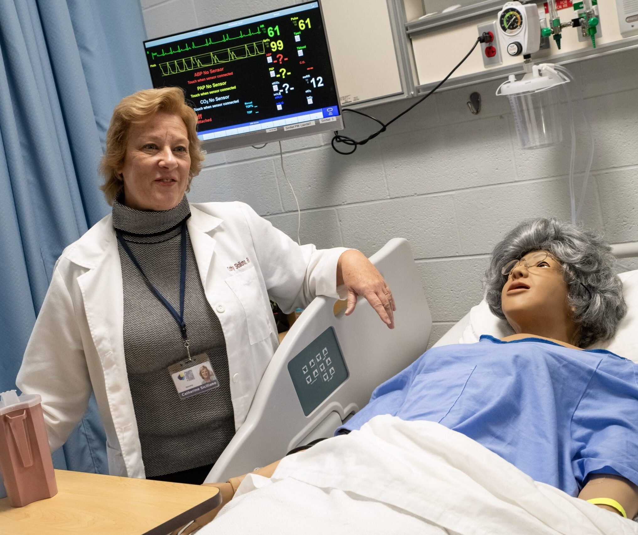 nurse, sim center, faculty