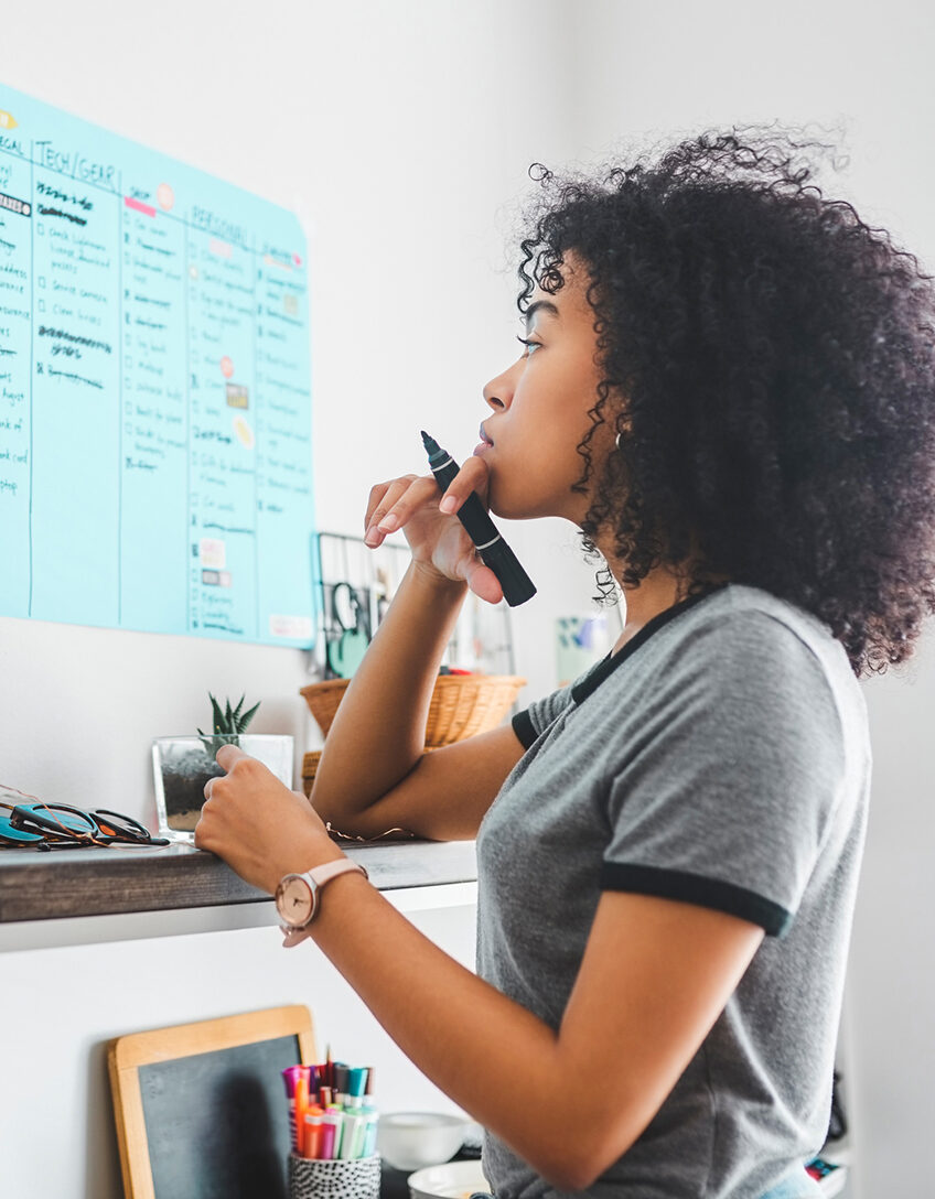 student pondering schedule