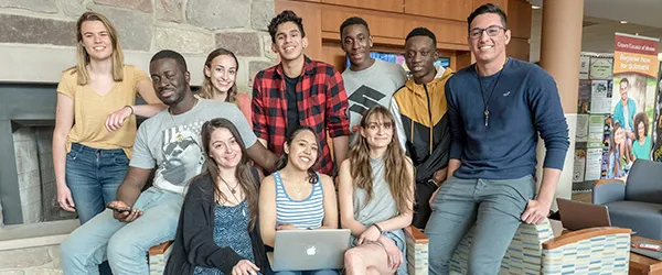 Image of a large group of students in the student community center