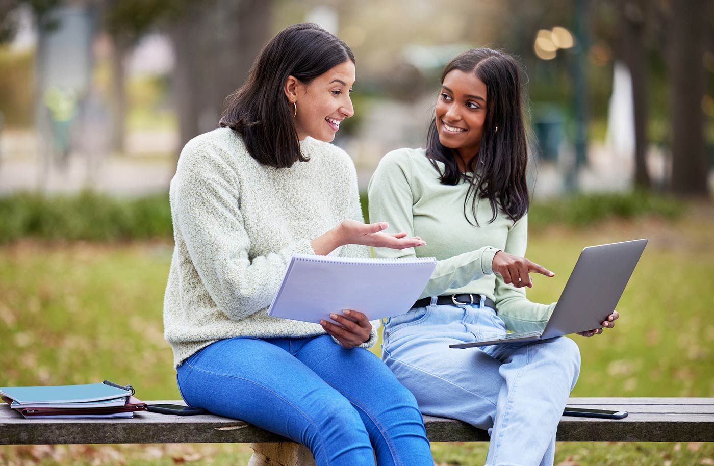 Two female students outside