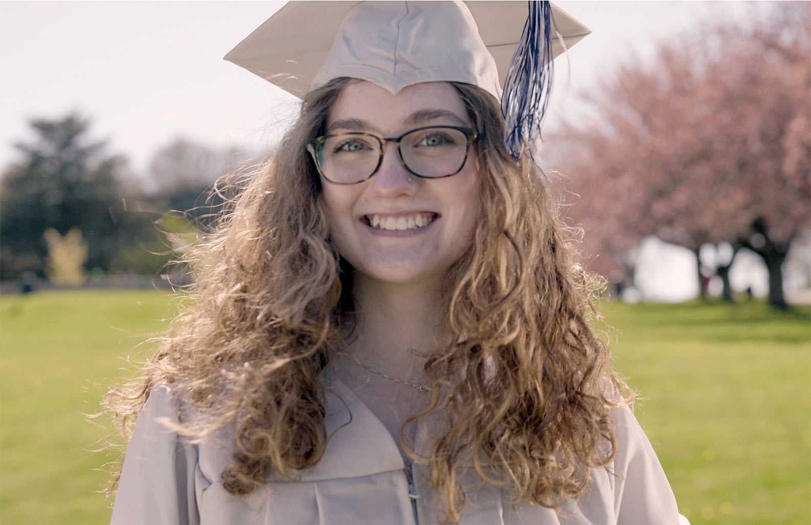 Female student with cap and gown