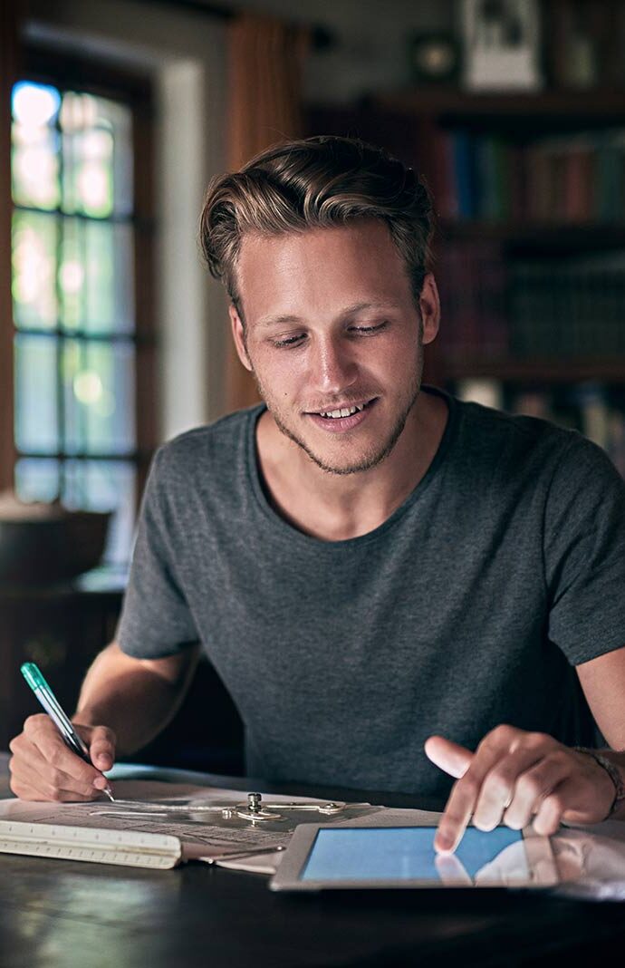 Male student working at home