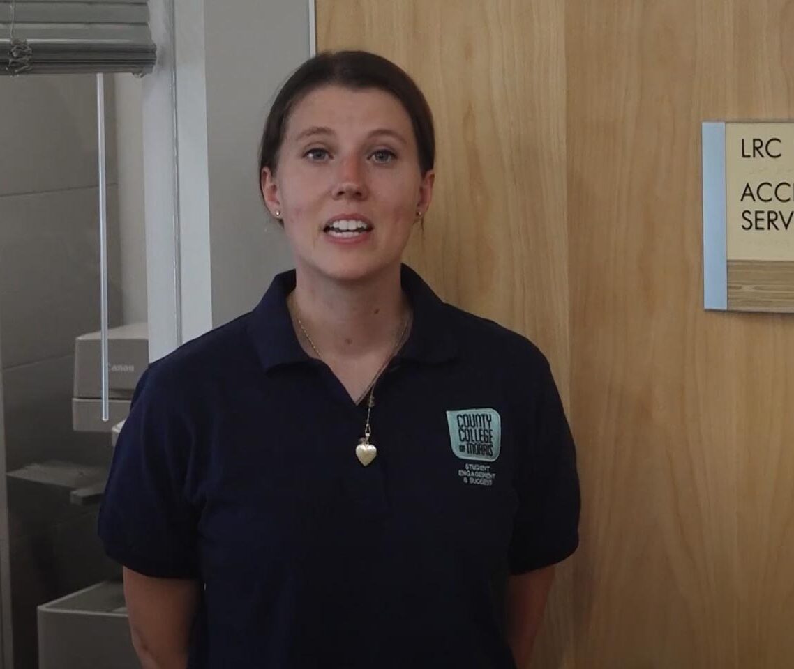 Woman explaining Accessibility Services at CCM