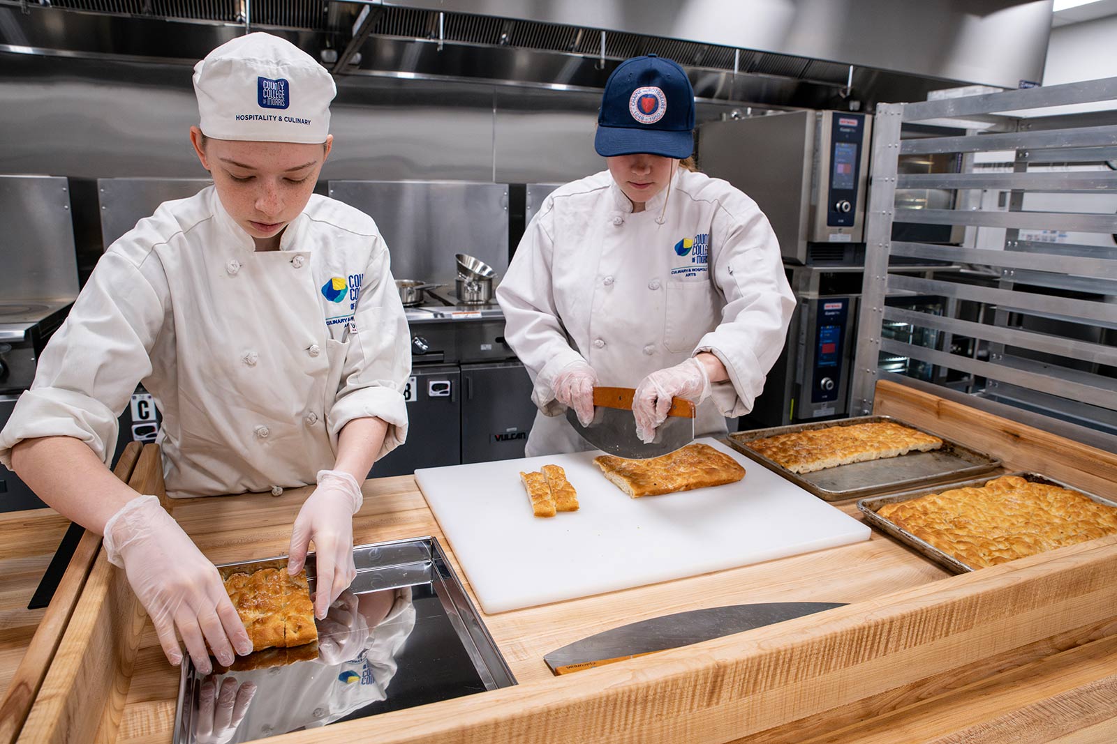 Students working in the baking kitchen