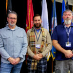 Three veterans posing
