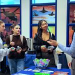 Counselor speaking to a group of veterans